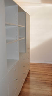 Hyqual Cabinets manufactures custom-built cabinets to fit any space, not module cabinets